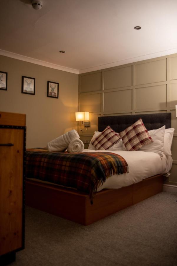 Hotel The Oak House Axbridge Exteriér fotografie A bedroom at the hotel
